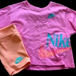 NOT FOR SALE.    ISO: Nike Pink Crop Tee with Peach Bike Shorts and Teal Accents